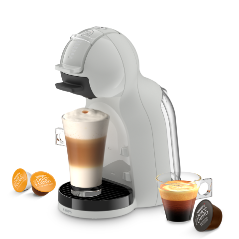 Mini Me 2 koffiemachine met een latte, een espresso en drie capsules